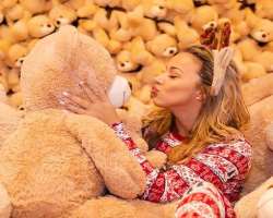 Though she is grown up now she still loves to play with teddy like a small girl. (So Cute!)